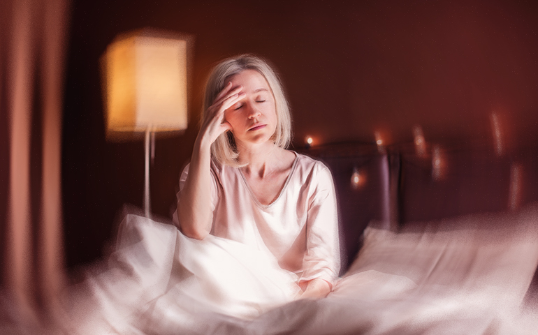 Woman in distress experiencing a hot flash