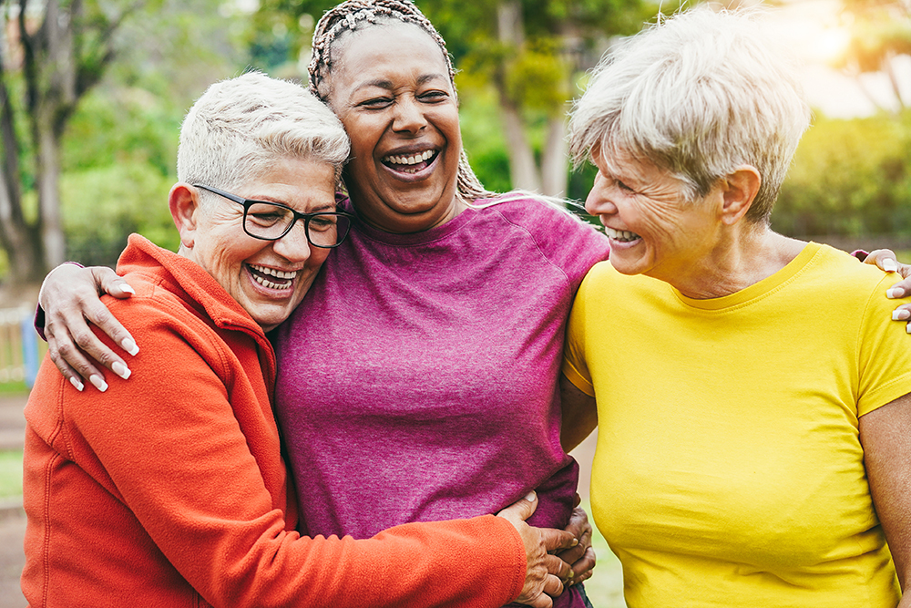 Multiracial senior women having fun together after sport workout outdoor